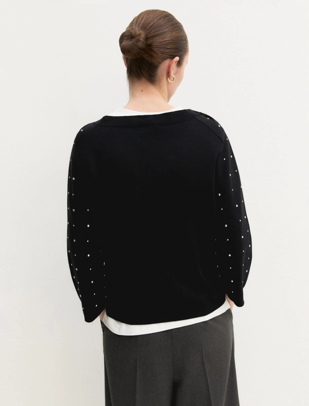 MAGLIA CON APPLICAZIONI EMME