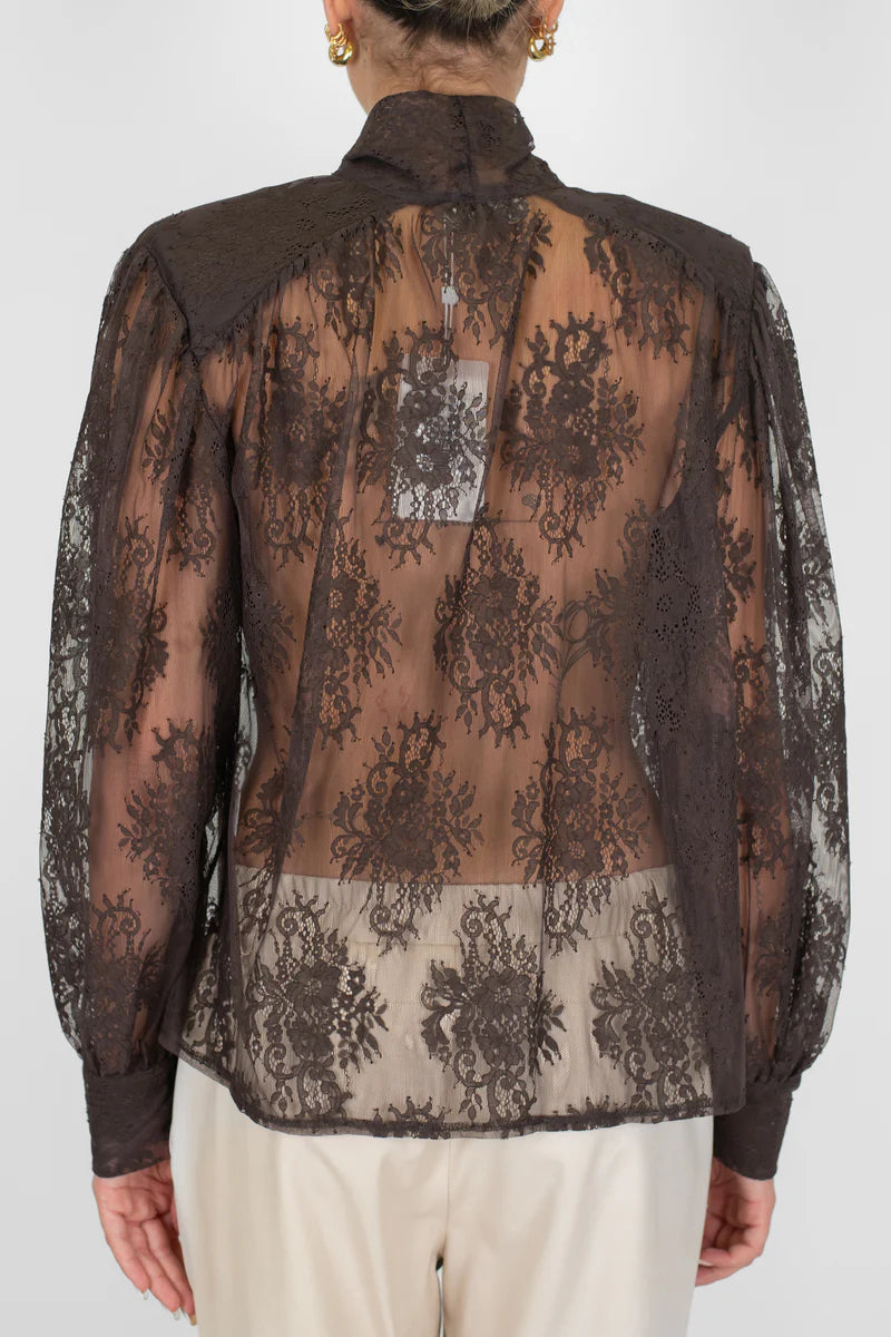 BLUSA RICAMATA IN PIZZO CON TRASPARENZE E FIOCCO AL COLLO MOTEL