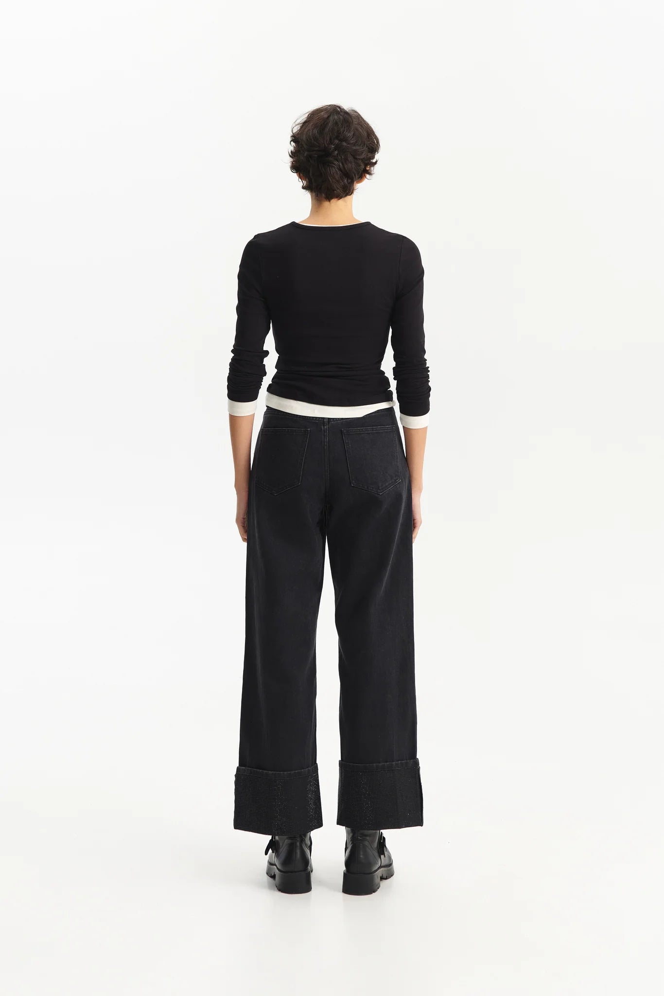 JEANS NERO CON RISVOLTO E STRASS ELEH