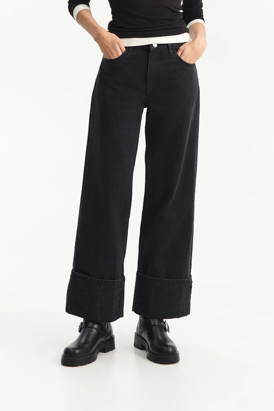 JEANS NERO CON RISVOLTO E STRASS ELEH